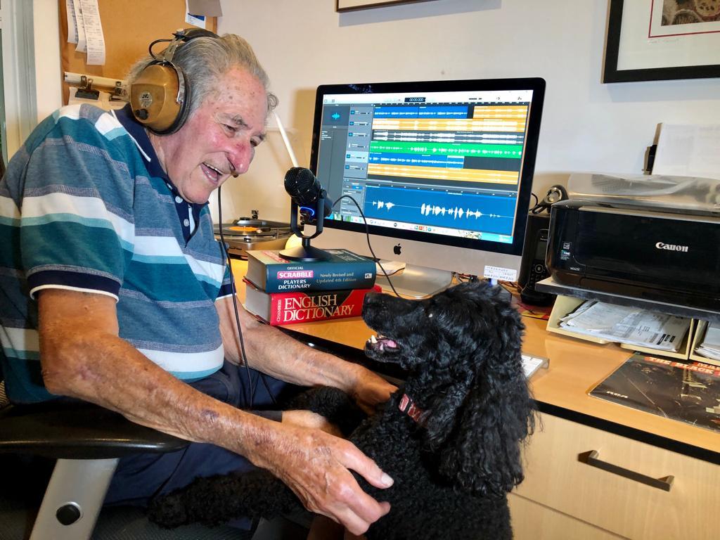 Owen Fisher with his poodle (and production assistant) Arvi while they work on Bach to Front